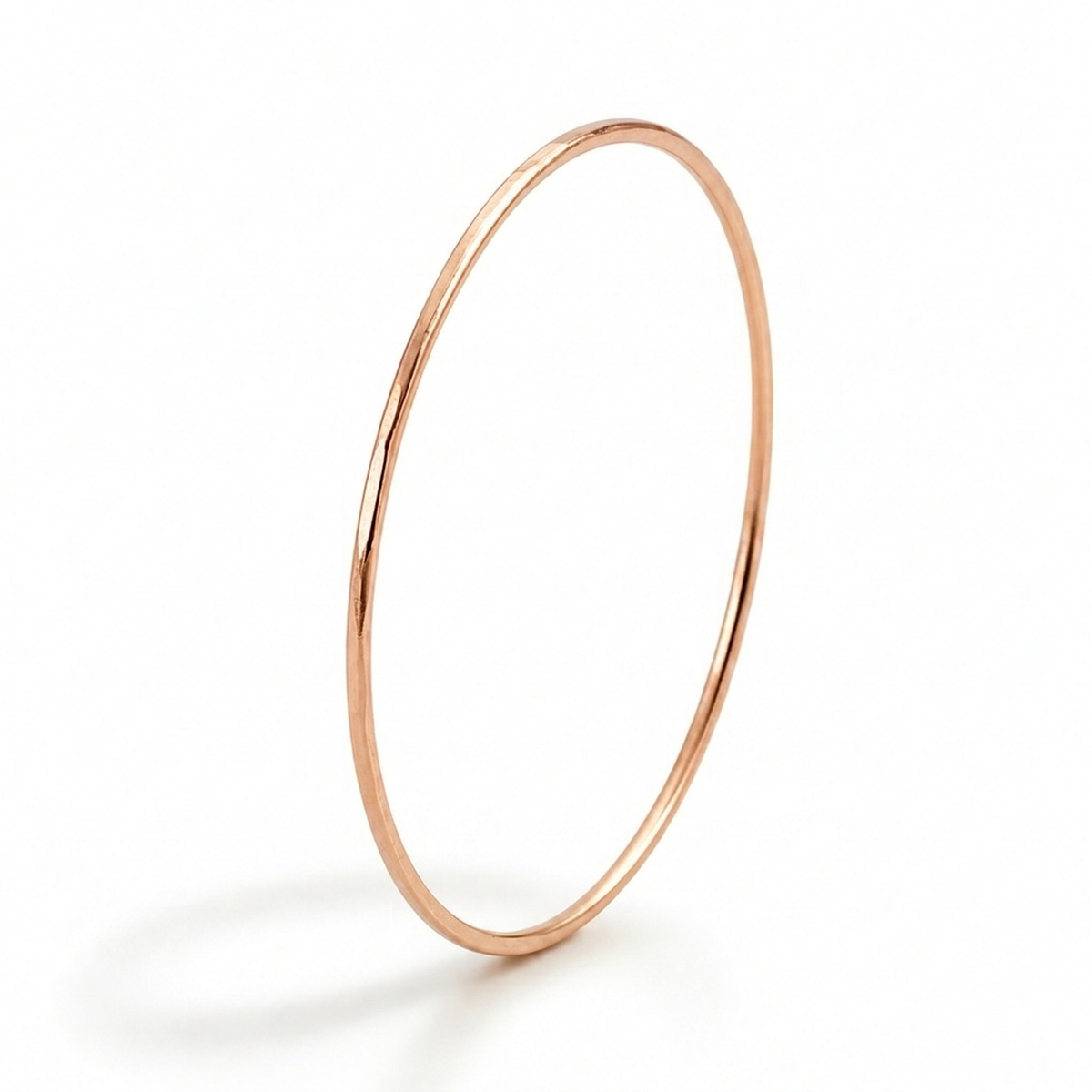 9ct rose gold hammered stacking ring, 1mm diameter