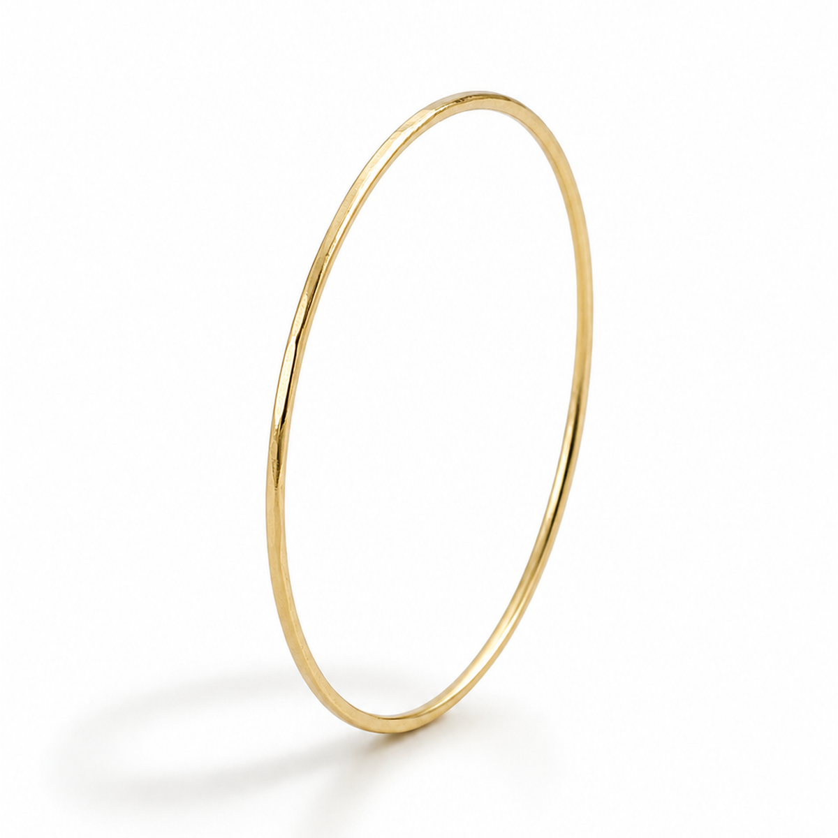 9ct yellow gold hammered stacking ring, 1mm diameter
