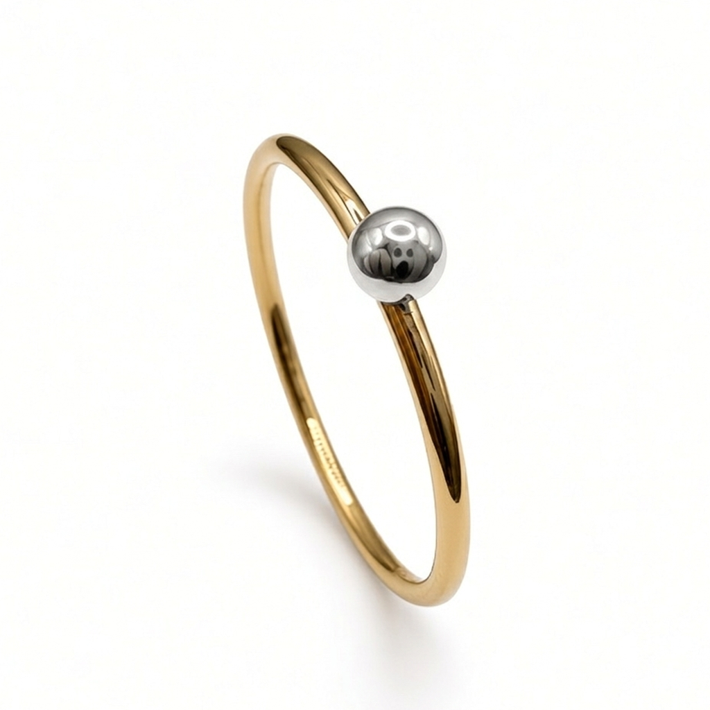 9ct yellow gold ring with silver bead