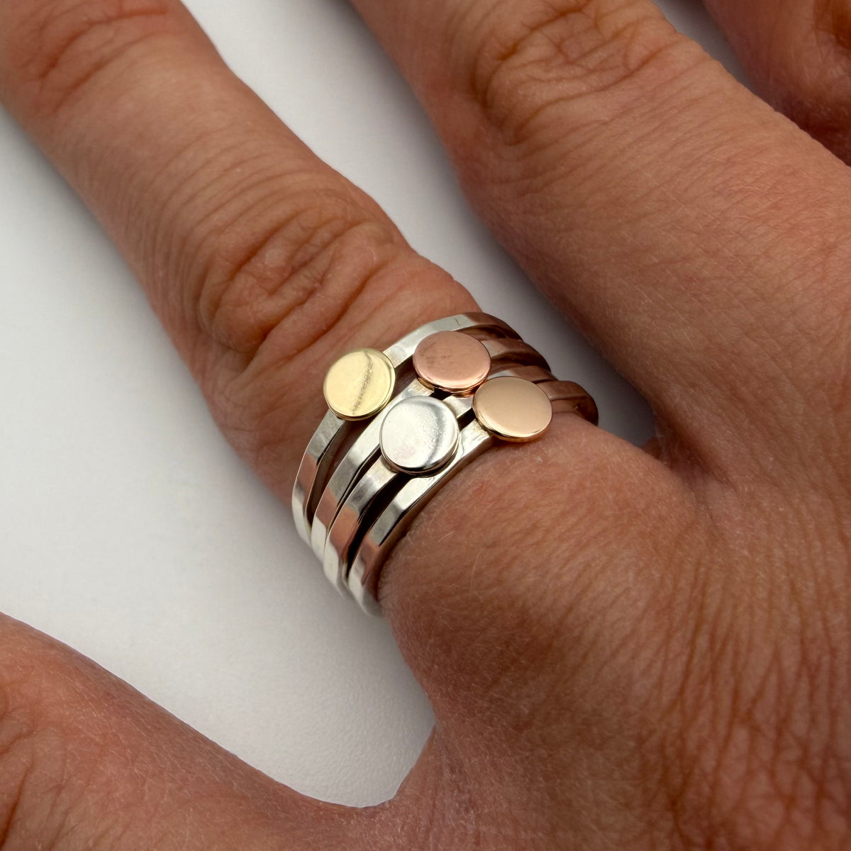 hammered sterling silver disc ring close up