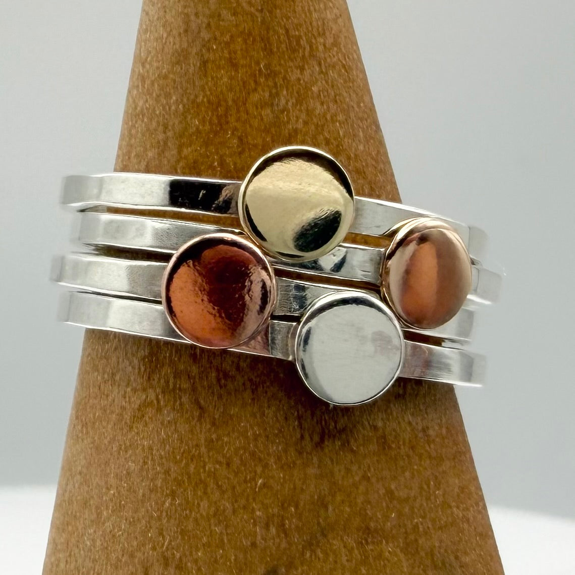 hammered sterling silver disc ring on finger