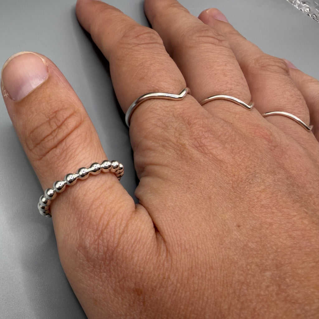 Sterling silver wishbone ring on hand