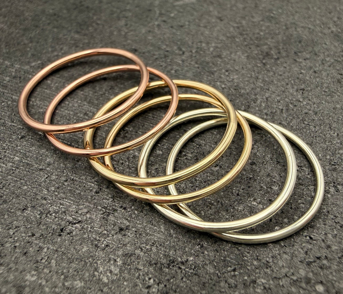 9ct gold 1mm dainty ring on finger