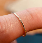 9ct yellow gold 1mm stacking ring worn on hand