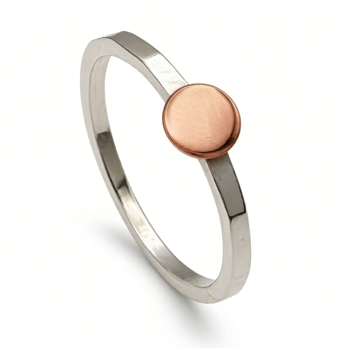 hammered sterling silver disc ring with copper disc