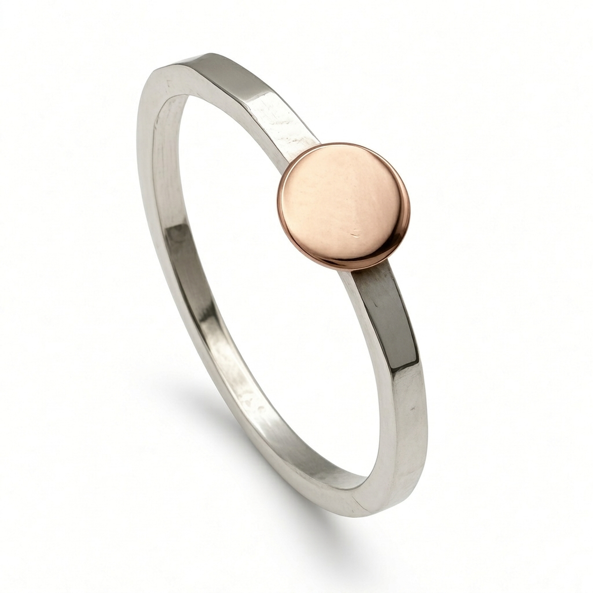 hammered sterling silver disc ring with rose gold disc