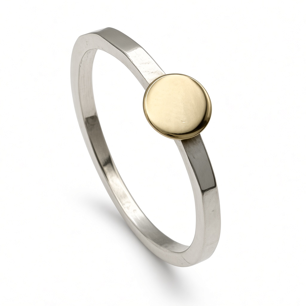 hammered sterling silver disc ring with yellow gold disc