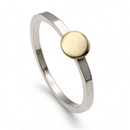 hammered sterling silver disc ring with yellow gold disc